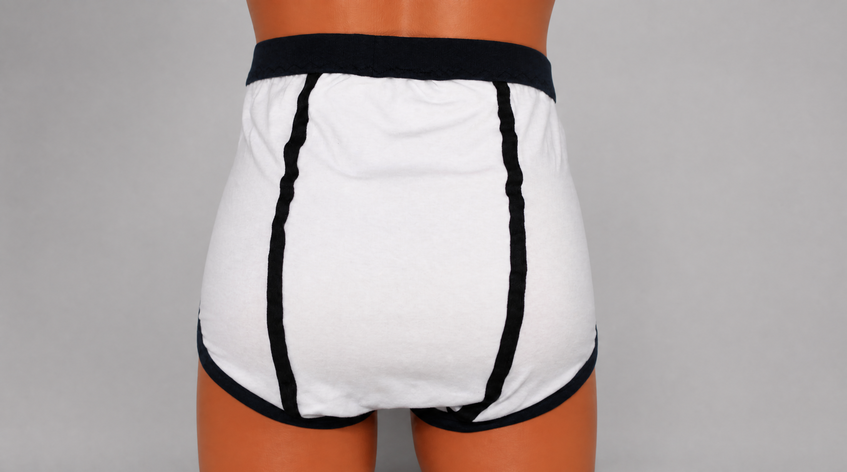 White and black retro double seat cotton briefs — rear view showing double seat panel construction and black seam piping